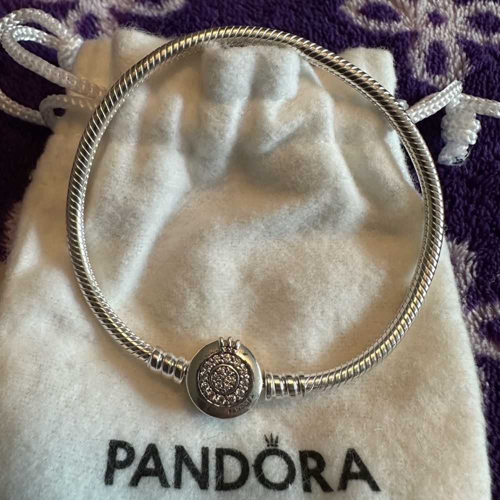 New Pandora charm bracelet , never worn. Crown design on clasp